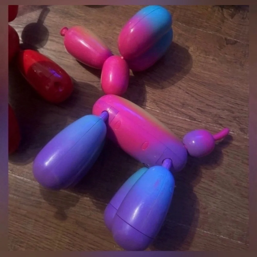 Squeakies interactive balloon animal rainbow dog